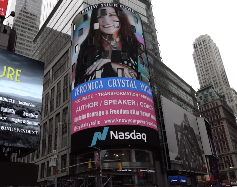 Time square photo of veronica above the nasdaq sign
